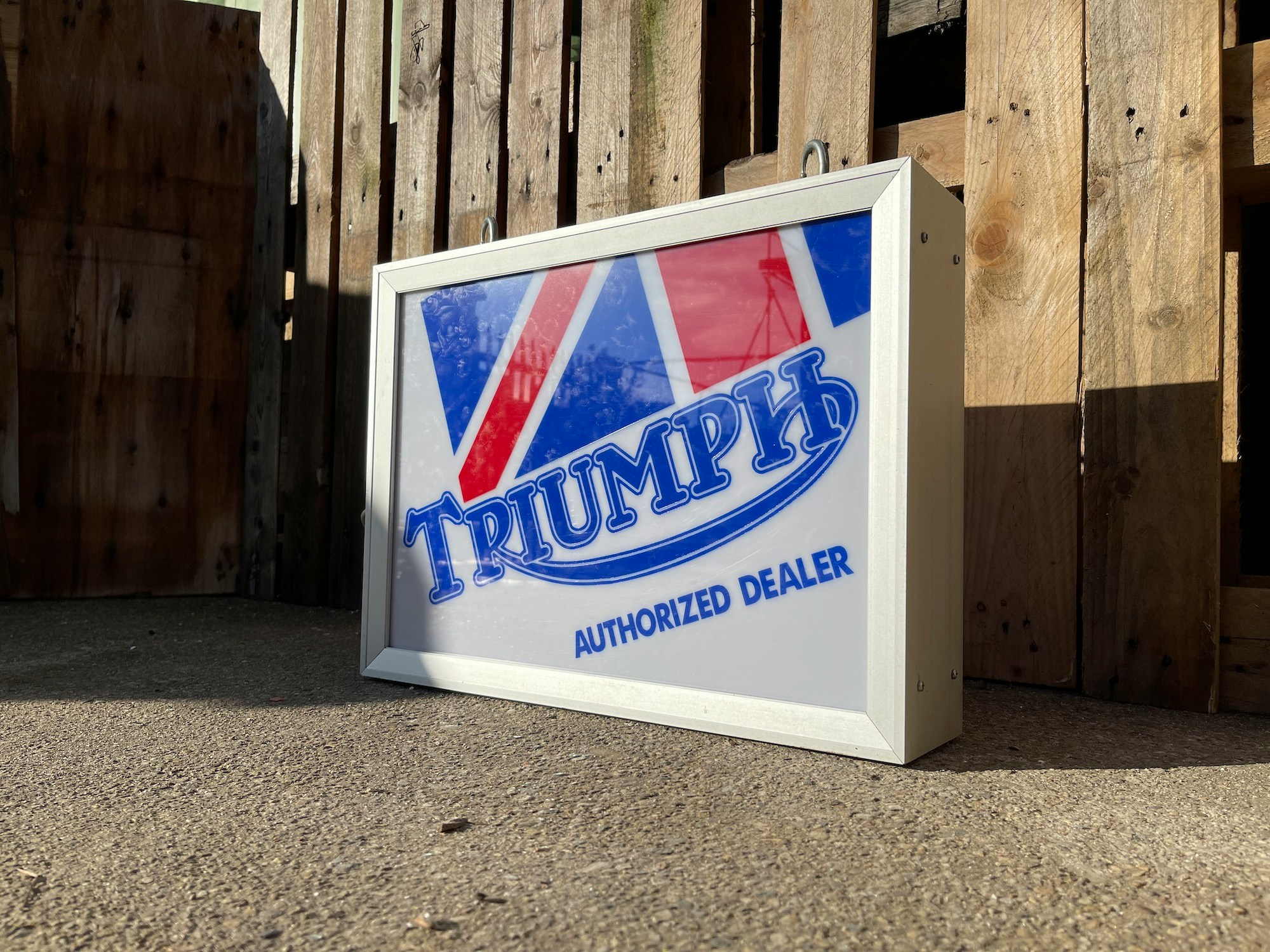 TRIUMPH DOUBLE SIDED ILLUMINATED DEALERSHIP SIGN for sale by