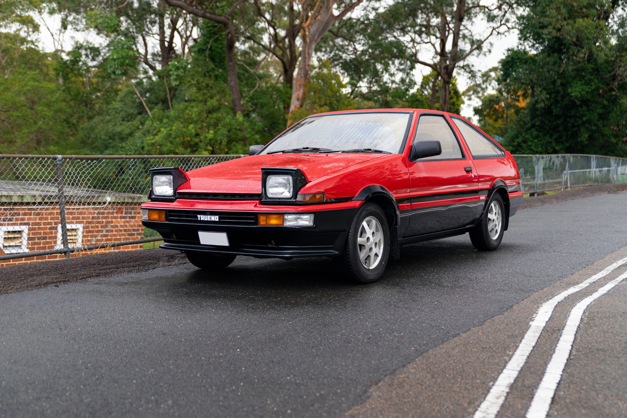 1986 Toyota Trueno (AE86) RHD (Right Hand Drive) #25 White with Graphics  and Aggretsuko Diecast Figure 